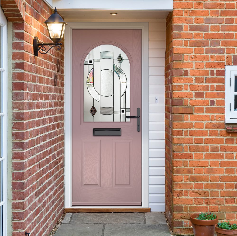 Pink composite door with arched glass
